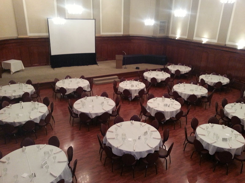 The Corinthian Event Center grand ballroom banquet room setup for a corporate event, view from mezzanine.