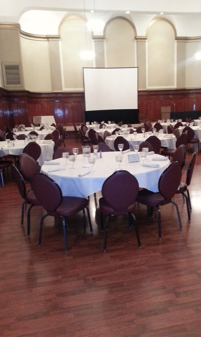 The Corinthian Event Center grand ballroom banquet room setup for a corporate event.