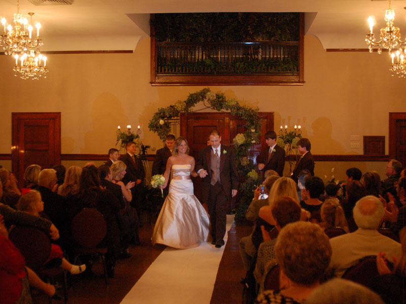 The Corinthian Event Center third floor banquet room during a wedding ceremony, man and wife.