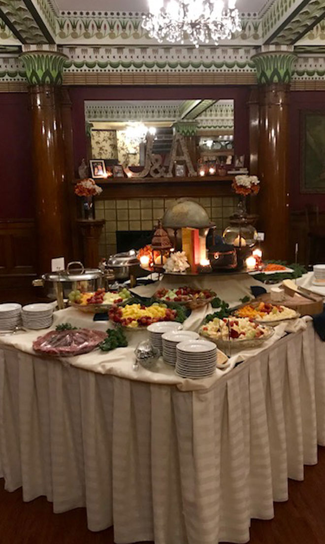 Cheese, fruit, and vegetable display in the Fireplace banquet room at The Corinthian Event Center.