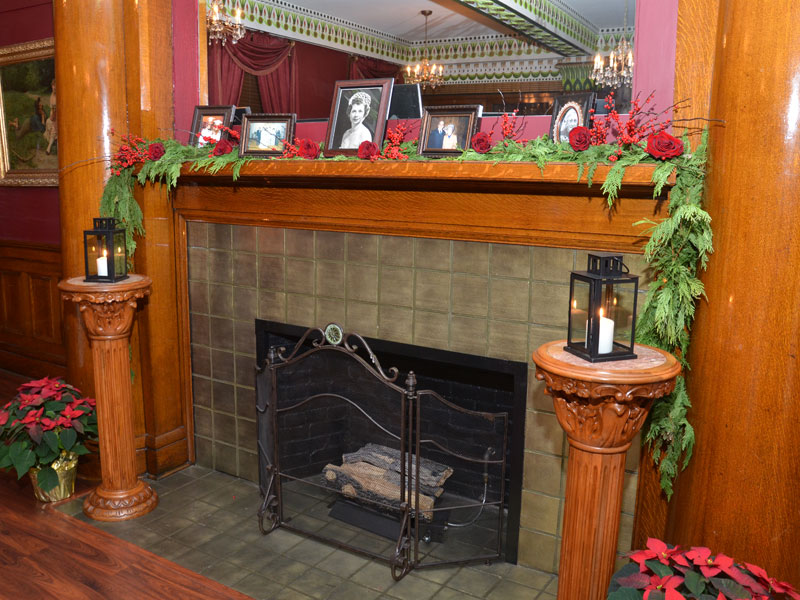 Fireplace at The Corinthian Event Center setup at Christmass time.