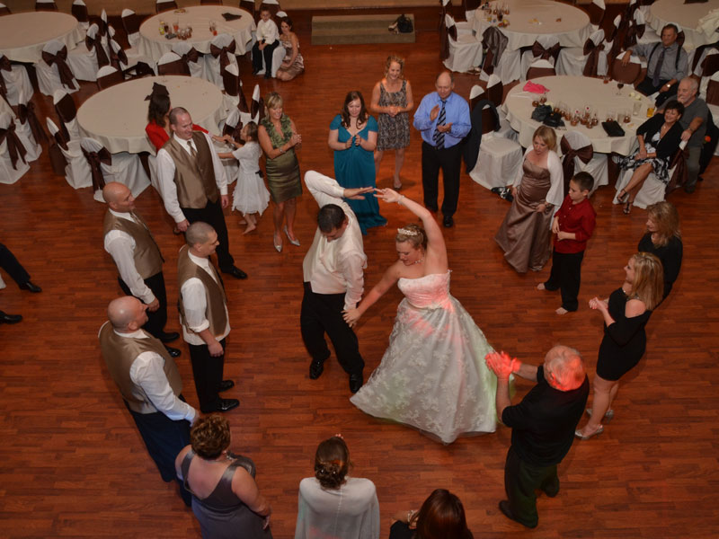 Bride and Groom dance in Grand Ballroom at The Corinthian Event Center.