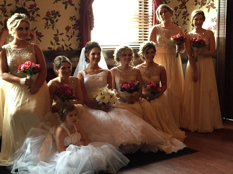 Bridal party in private bridal room at The Corinthian Event Center.