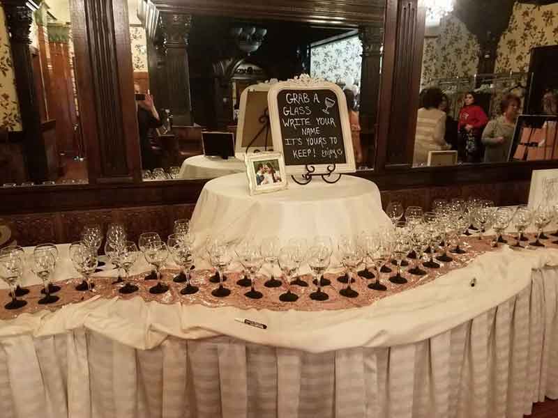 Wine glasses table at The Corinthian Event Center.